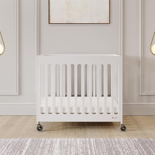 Foundations Boutique Folding Hotel Crib and Sheet Bundle - Includes Wooden Mini Crib with 3" Foam Mattress (White) and 6-Pack White Fitted Compact Sheets
